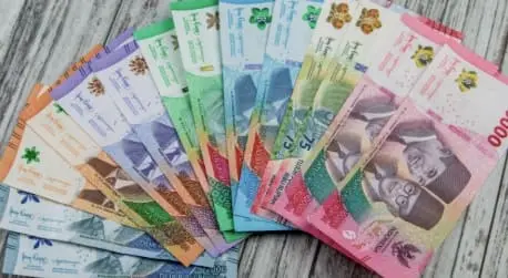 Bagaimana asal mula terciptanya uang